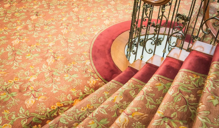 close-up-staircase-covered-with-carpet_1232-3564