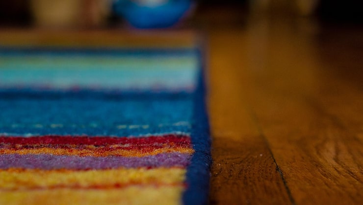 high-angle-view-multi-colored-rug-floor_1048944-3850689